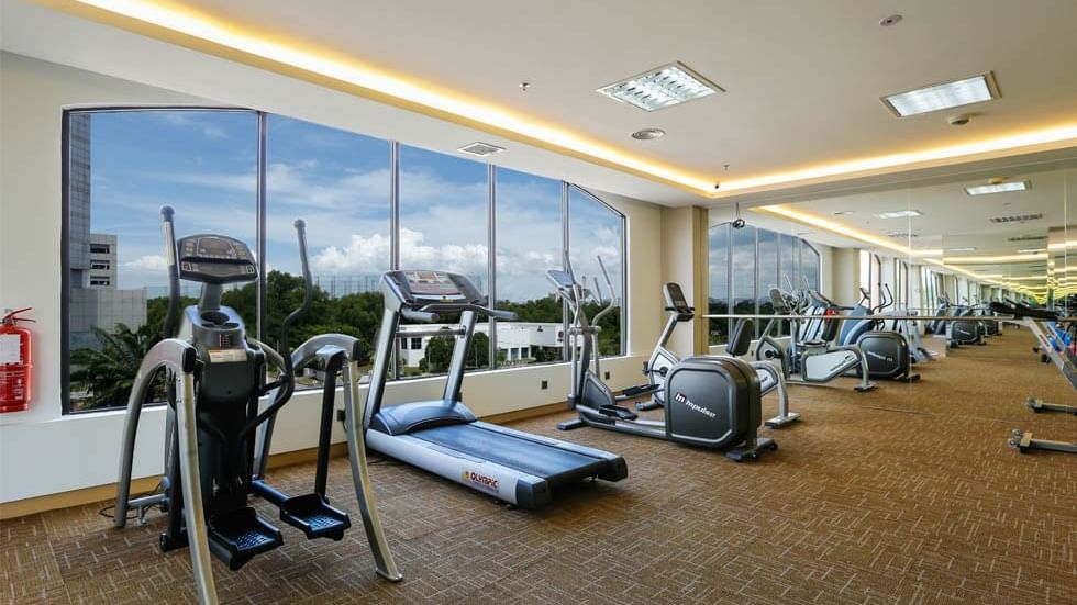Modern gym facility with various exercise equipment